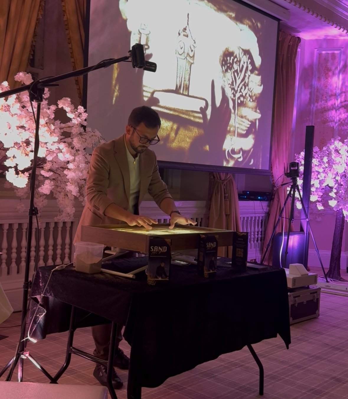 Wedding sand art performance at Manchester Hall